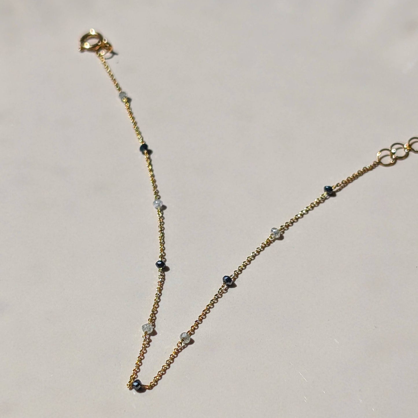 The Élan Bracelet – 18K Gold with Black & White Diamonds