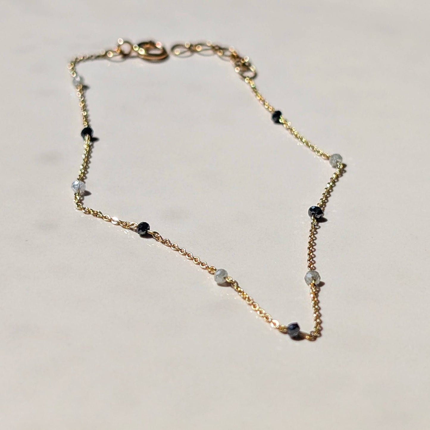 The Élan Bracelet – 18K Gold with Black & White Diamonds