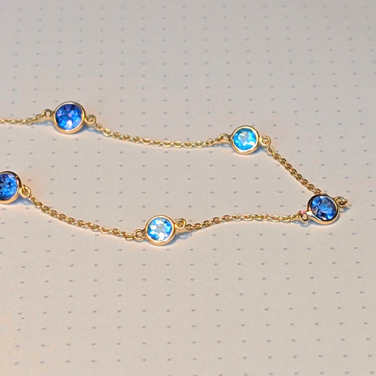 Blue Rhythm – 18K Tanzanite & Swiss Topaz Necklace