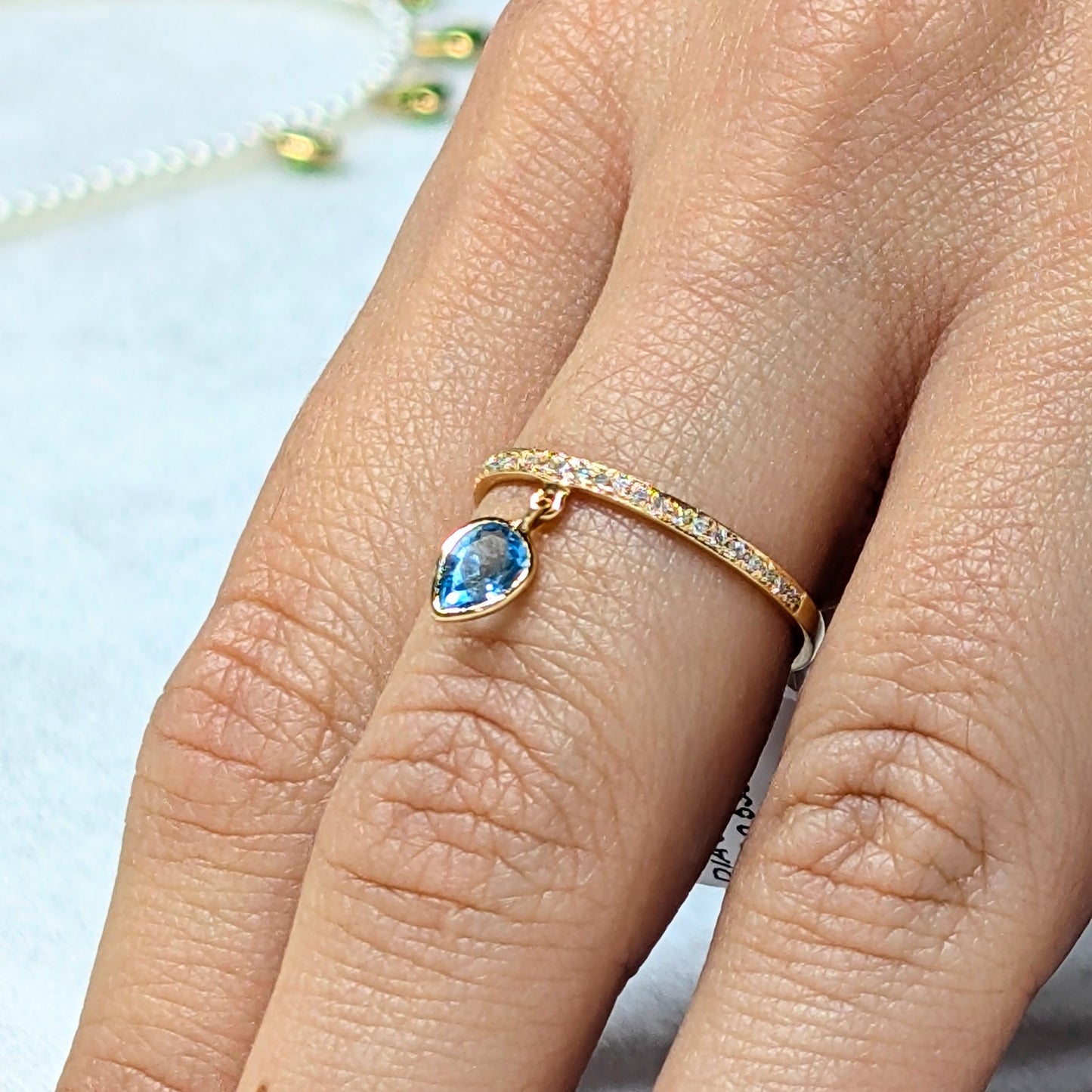 Azure Drop – 18K Blue Topaz & Diamond Ring