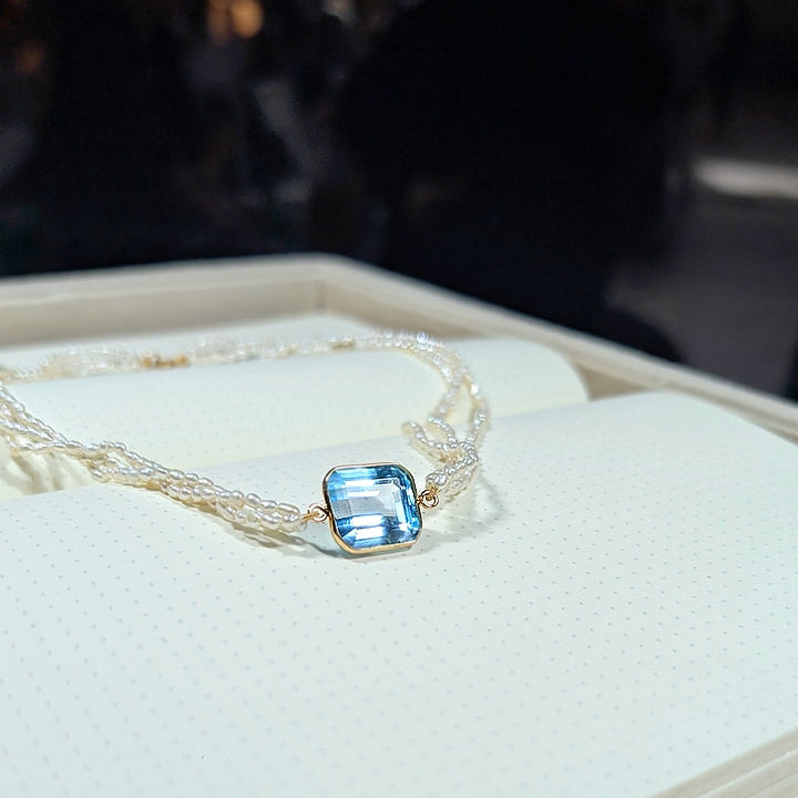 Azure Poise – 18K Swiss Blue Topaz & Pearl Necklace