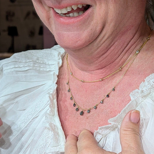 Woman wearing a white blouse with a blurred background