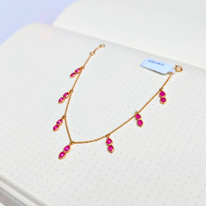 The Crimson Dance – 18K Gold Ruby Bracelet